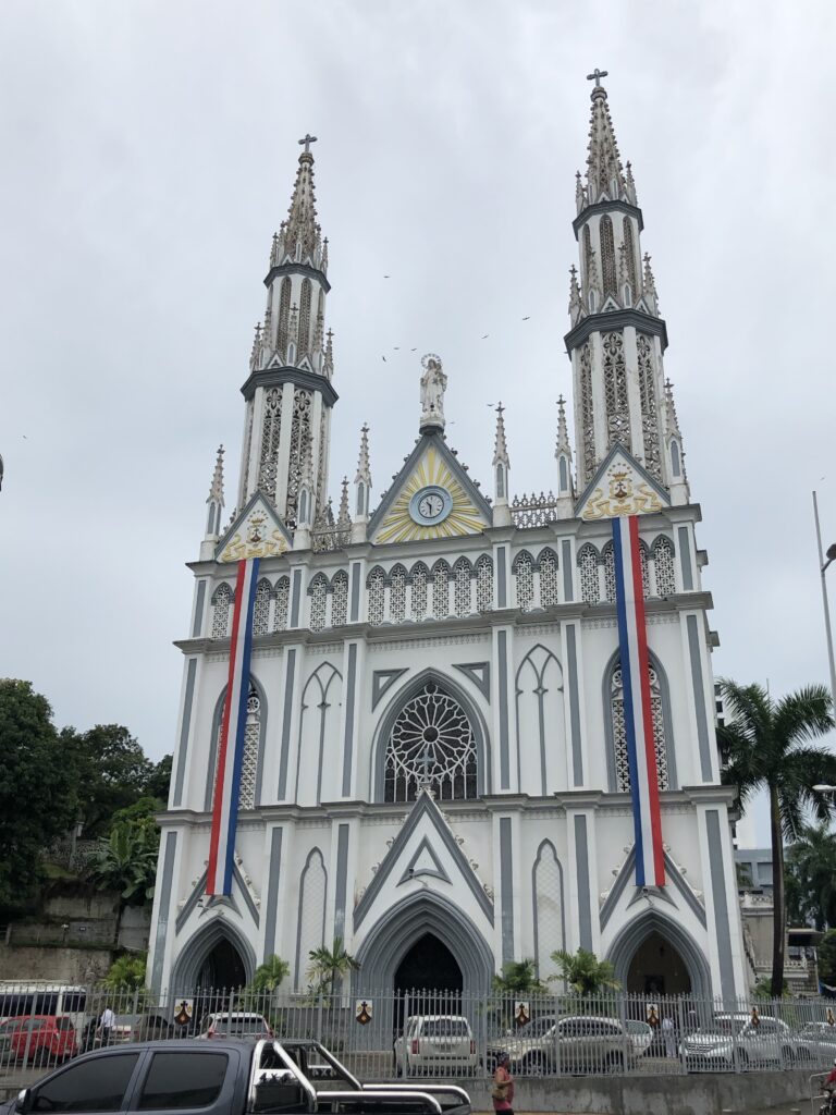 St. Carmen church with red, white, and blue banners