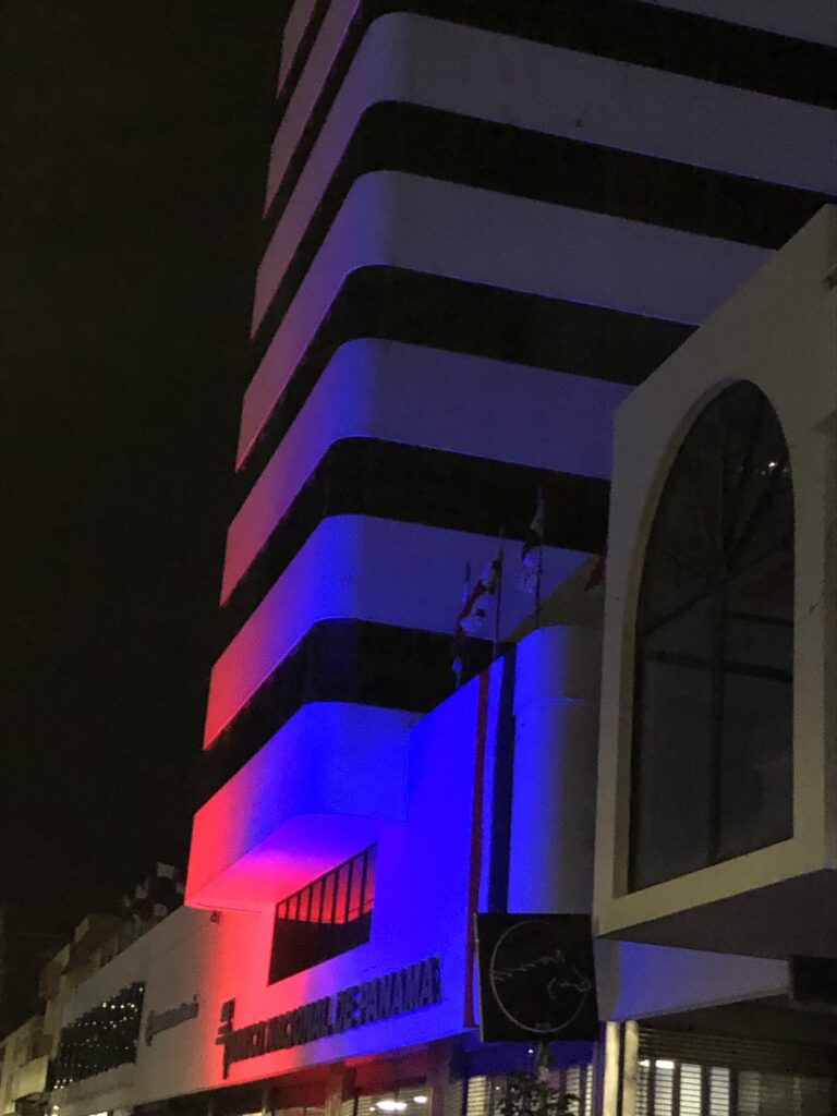 A bank lit up to celebrate Panama's national holidays